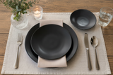 Swap the napkin color to a beige pink color instead of the blue color 